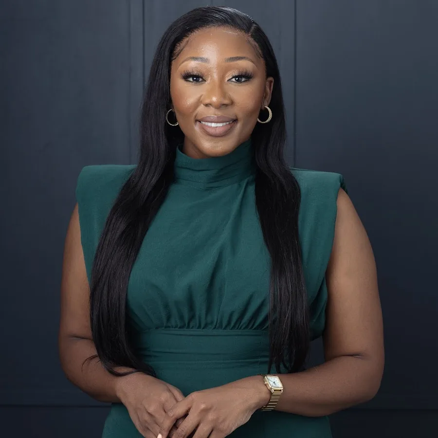 Studio portrait of Lebo Lion in an emerald dress